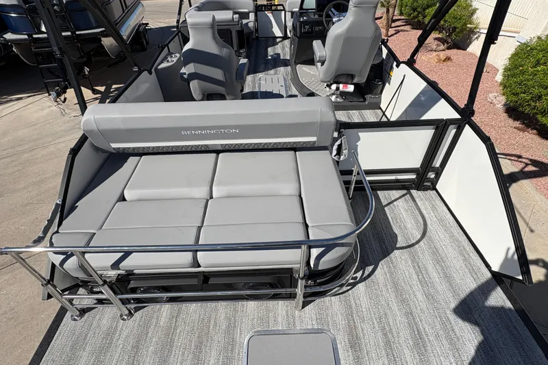 Slide: The Image of 2026 Bennington 22 MSB pontoon boat interior with gray seating and modern design. - 15