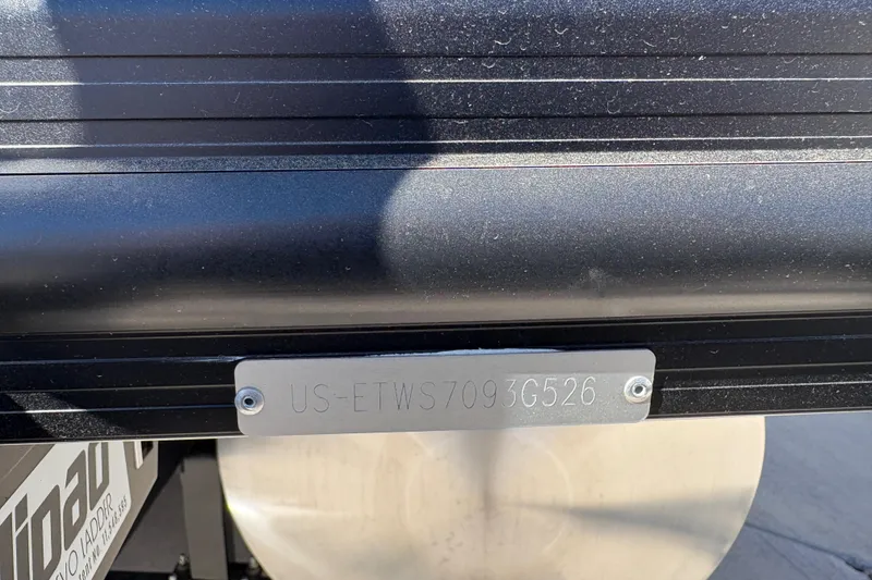 Slide: The Image of 2026 Bennington 22 MSB boat with visible hull identification number. - 24