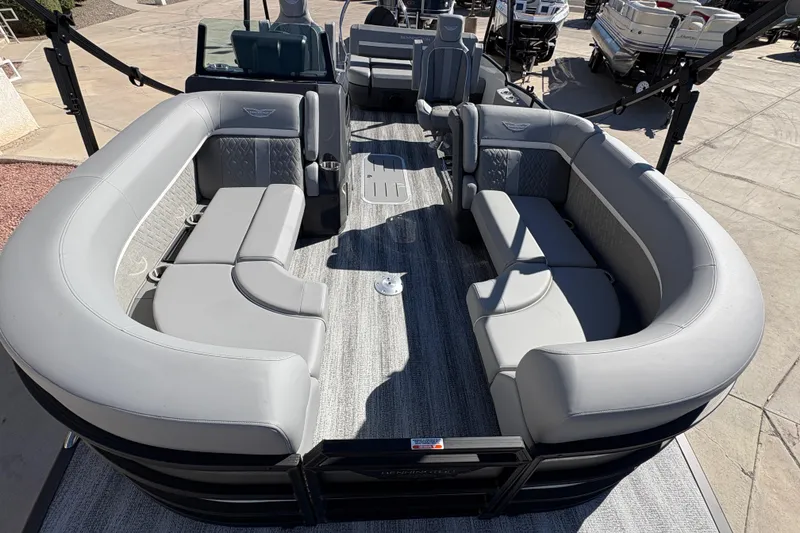 Slide: The Image of 2026 Bennington 22 MSB pontoon boat with luxurious gray seating and spacious deck layout. - 5