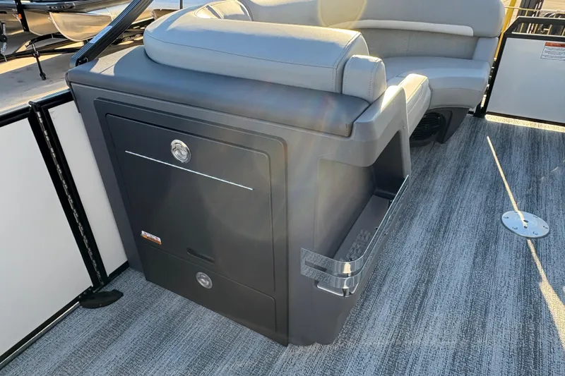 Slide: The Image of 2026 Bennington 22 MFB boat interior with seating and storage compartment. - 10