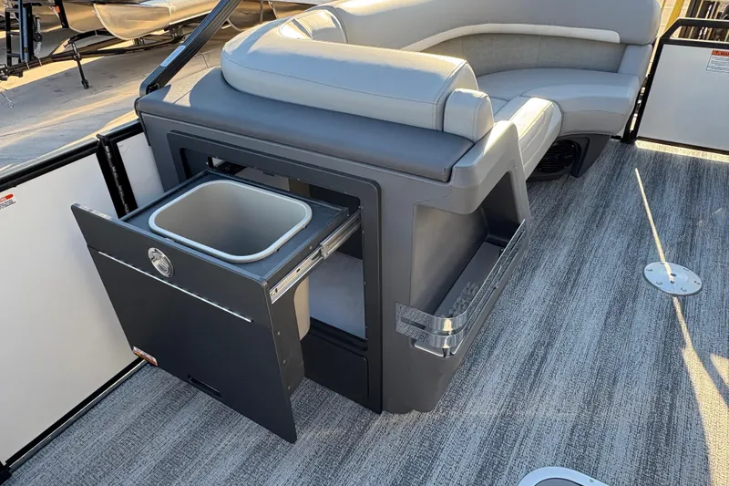 Slide: The Image of 2026 Bennington 22 MFB boat interior with built-in storage and seating. - 16