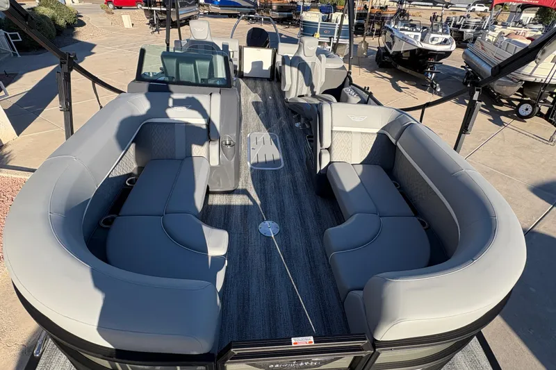 Slide: The Image of 2026 Bennington 22 MFB pontoon boat with luxurious gray seating and spacious deck layout. - 5