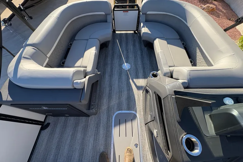 Slide: The Image of Interior of 2026 Bennington 22 MFB pontoon boat with gray seating and flooring. - 6