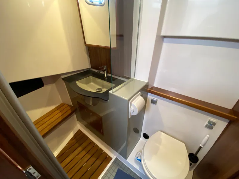 Slide: The Image of Bathroom interior of 2019 Sargo 36 Explorer yacht with modern fixtures and wooden accents. - 22