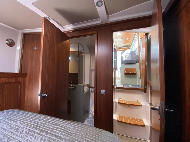 Slide: The Image of Interior of 2019 Sargo 36 Explorer yacht with wooden doors and modern design. - 23