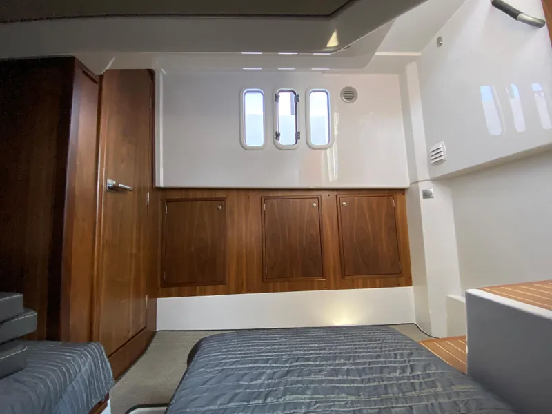 Slide: The Image of Interior cabin of 2019 Sargo 36 Explorer with wooden accents and natural light. - 31