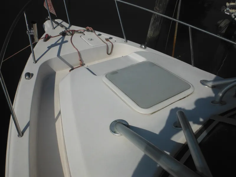 Slide: The Image of 2002 Pro-Line 23 Walk boat deck with hatch and railing. - 11