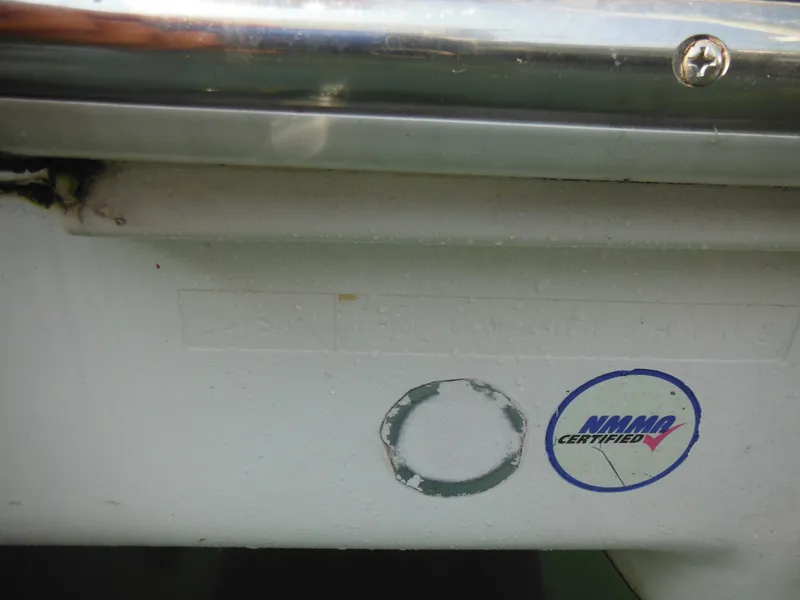 Slide: The Image of 2002 Pro-Line 23 Walk boat with NMMA certification sticker on the hull. - 29