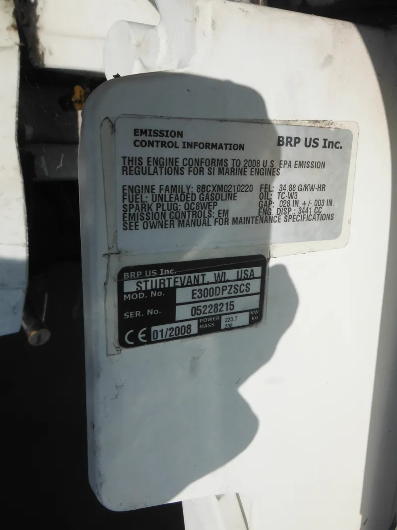 Slide: The Image of Emission control label on a 2002 Pro-Line 23 Walk marine engine. - 30