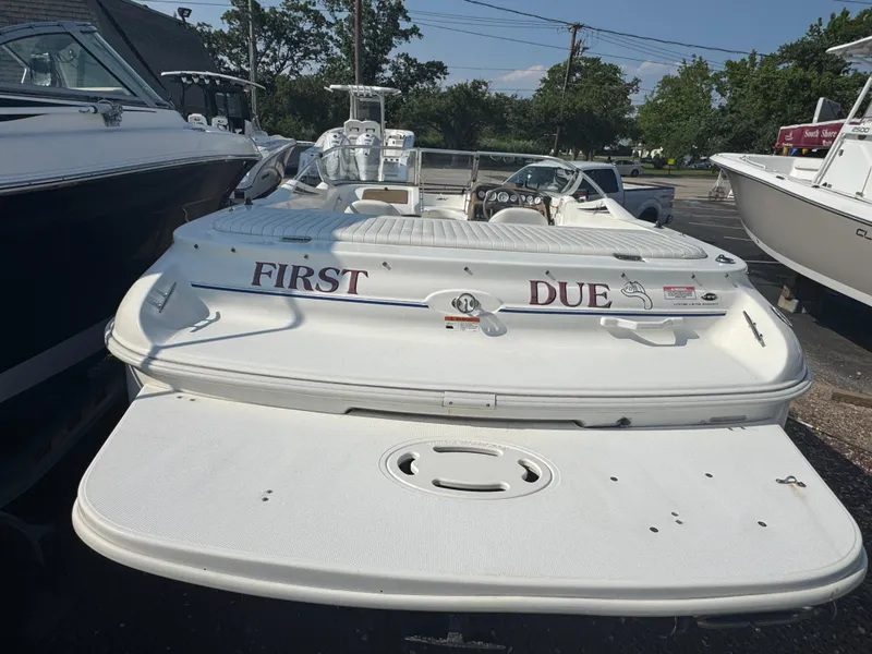 Slide: The Image of 2003 Glastron SX 195 boat with "First Due" text on the rear deck. - 3