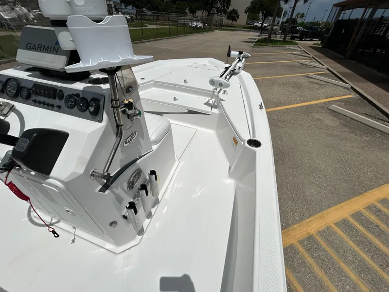 Slide: The Image of 2012 Blue Wave 1900 STL boat with Garmin equipment, parked in a lot. - 12