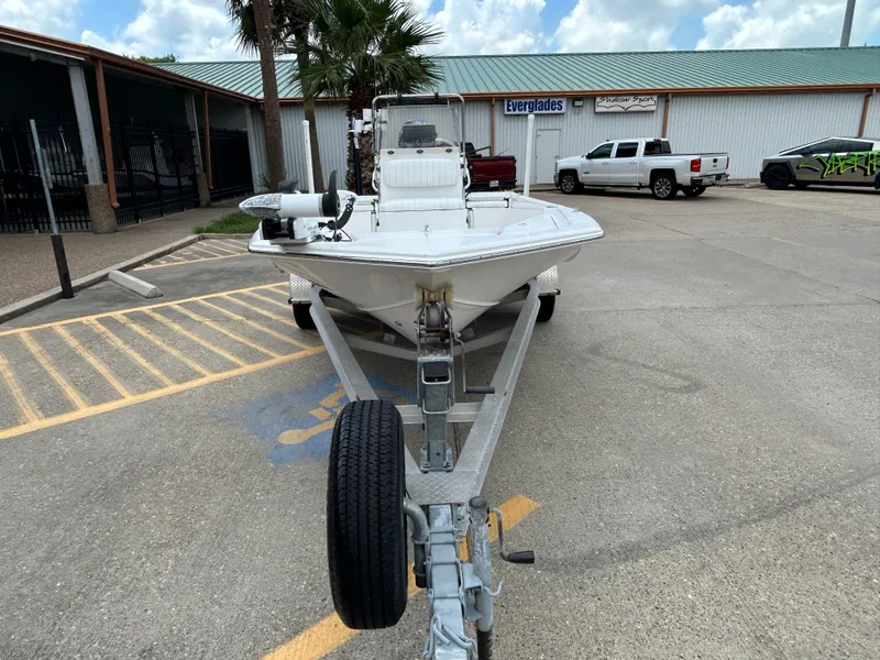 Slide: The Image of 2012 Blue Wave 1900 STL boat on trailer in parking lot. - 3