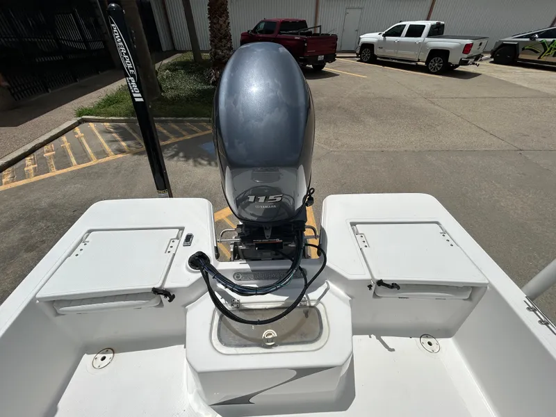 Slide: The Image of 2012 Blue Wave 1900 STL boat with Yamaha 115 engine in parking lot. - 7