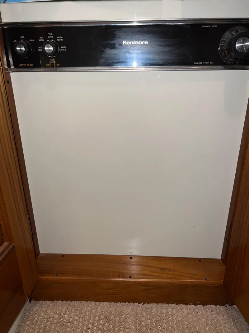 Slide: The Image of Kenmore dishwasher in a 1995 Viking Sports Yacht kitchen area. - 37