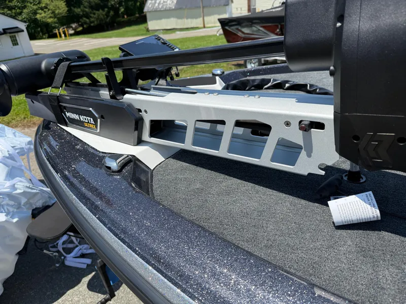 Slide: The Image of 2026 Skeeter ZXE20 boat with Minn Kota Ultrex trolling motor on deck. - 11