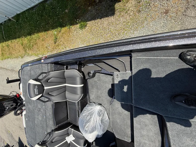 Slide: The Image of 2026 Skeeter ZXE20 boat interior with sleek seats and carpeted flooring. - 25