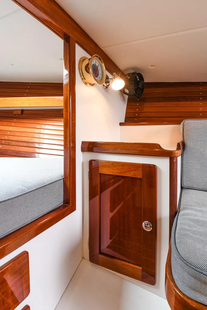 Slide: The Image of Interior of 2006 Morris M36 Daysailer with polished wood and cozy seating. - 35