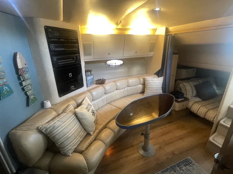 Slide: The Image of Luxurious interior of 1996 Regal Commodore 402 yacht with plush seating and elegant decor. - 10