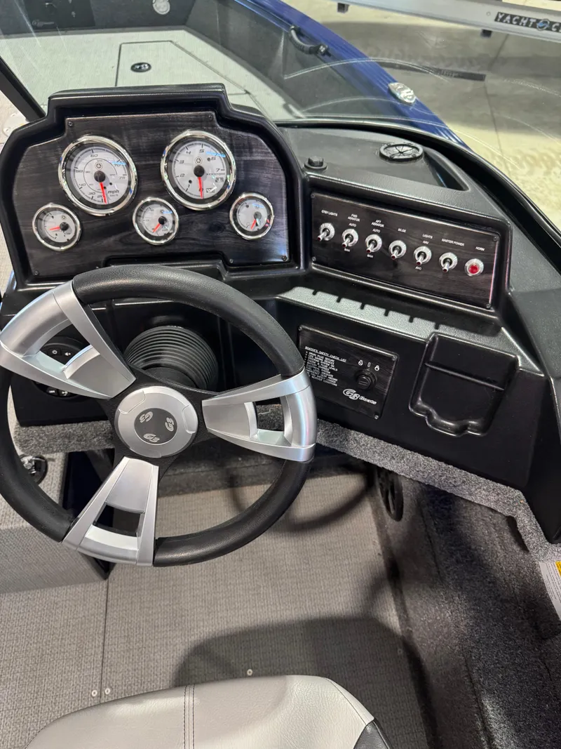 Slide: The Image of 2024 G3 AV18SF VINYL boat dashboard with steering wheel and instrument panel. - 11
