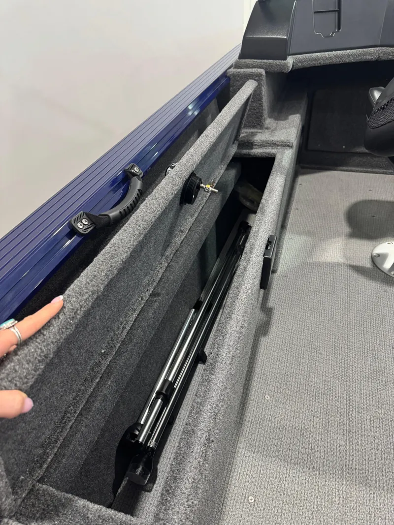 Slide: The Image of 2024 G3 AV18SF VINYL boat interior with storage compartment and carpeted flooring. - 8