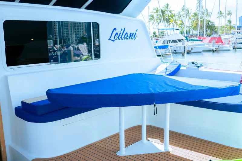 Slide: The Image of Luxury yacht deck with blue seating, marina view, 2005 Custom model. - 5