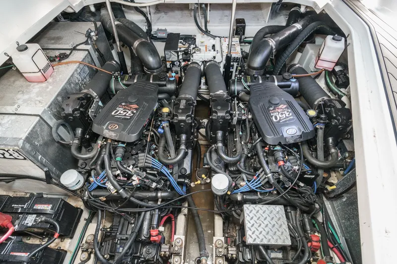 Slide: The Image of Engine compartment of a 2007 Sea Ray 310 Sundancer with twin MerCruiser engines. - 39