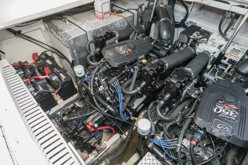 Slide: The Image of Engine compartment of a 2007 Sea Ray 310 Sundancer with twin MerCruiser engines. - 40
