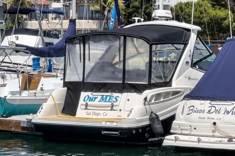 Slide: The Image of 2007 Sea Ray 310 Sundancer docked in San Diego marina. - 5