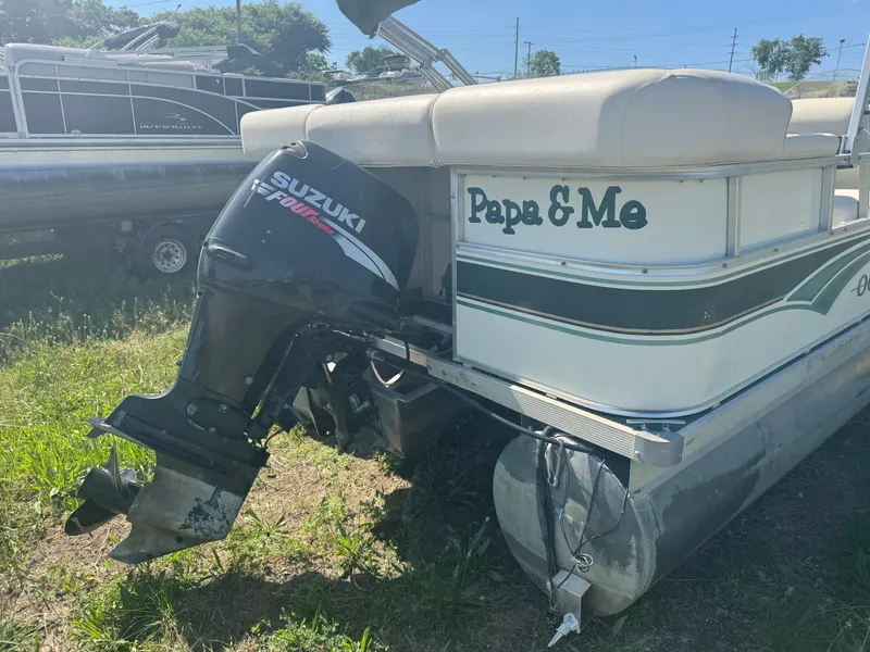 Slide: The Image of 2003 Odyssey MILLENIUM pontoon boat with Suzuki outboard motor, labeled "Papa & Me." - 8