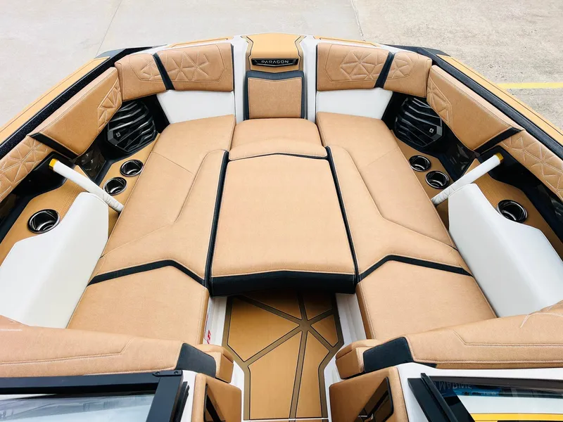 Slide: The Image of Luxurious interior of 2026 Nautique Super Air Nautique G25 Paragon boat. - 11