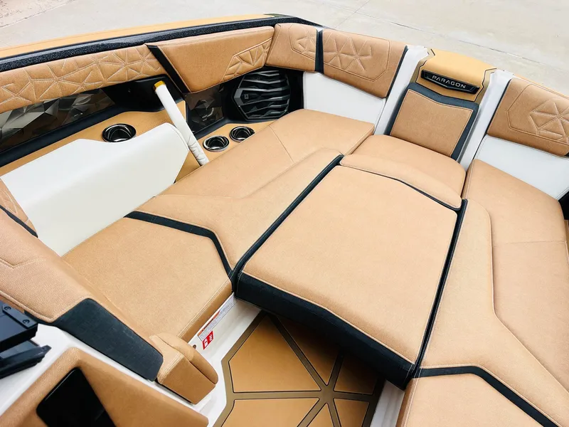 Slide: The Image of Luxurious interior of 2026 Nautique Super Air Nautique G25 Paragon boat. - 12