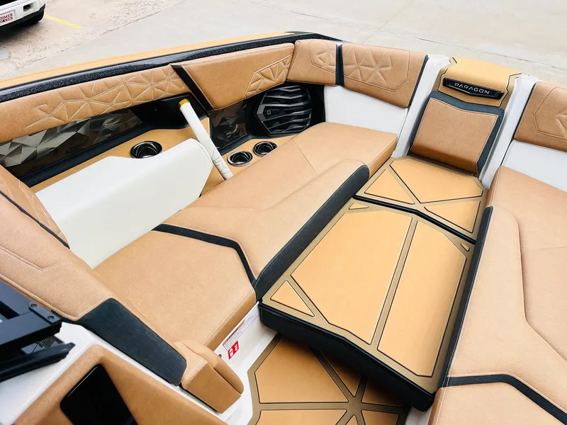 Slide: The Image of Luxurious interior of 2026 Nautique Super Air Nautique G25 Paragon boat. - 15