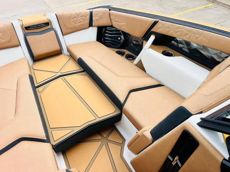 Slide: The Image of Luxurious interior of 2026 Nautique Super Air Nautique G25 Paragon boat. - 16