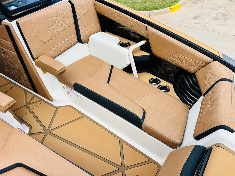 Slide: The Image of Luxurious interior of 2026 Nautique Super Air Nautique G25 Paragon boat. - 17