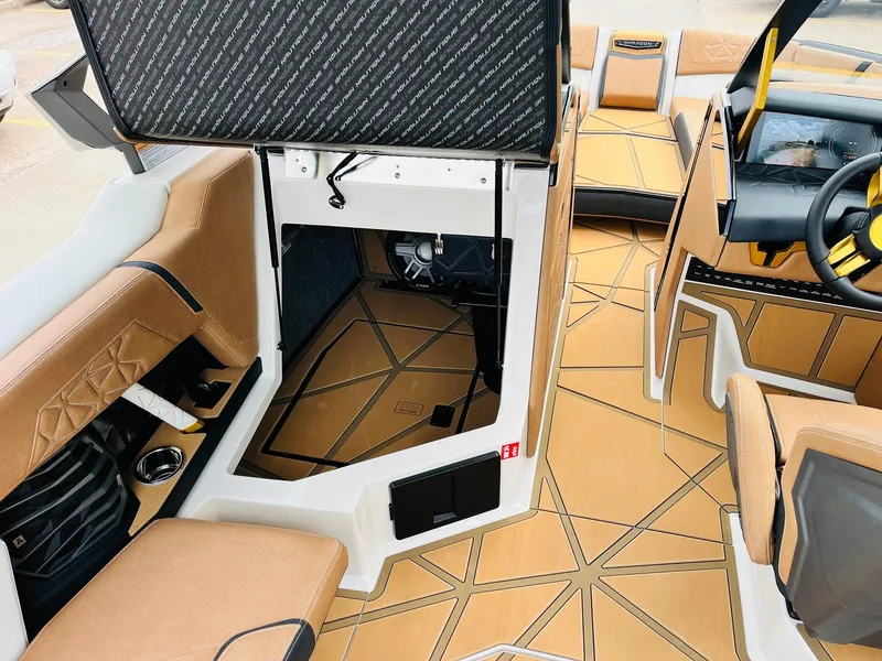 Slide: The Image of 2026 Nautique Super Air Nautique G25 Paragon interior with luxurious seating and modern dashboard. - 30