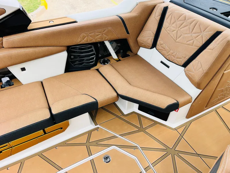 Slide: The Image of Luxurious interior of 2026 Nautique Super Air Nautique G25 Paragon boat. - 32
