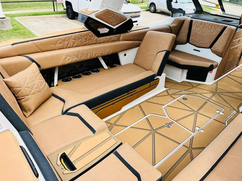 Slide: The Image of Luxurious interior of 2026 Nautique Super Air Nautique G25 Paragon boat. - 33