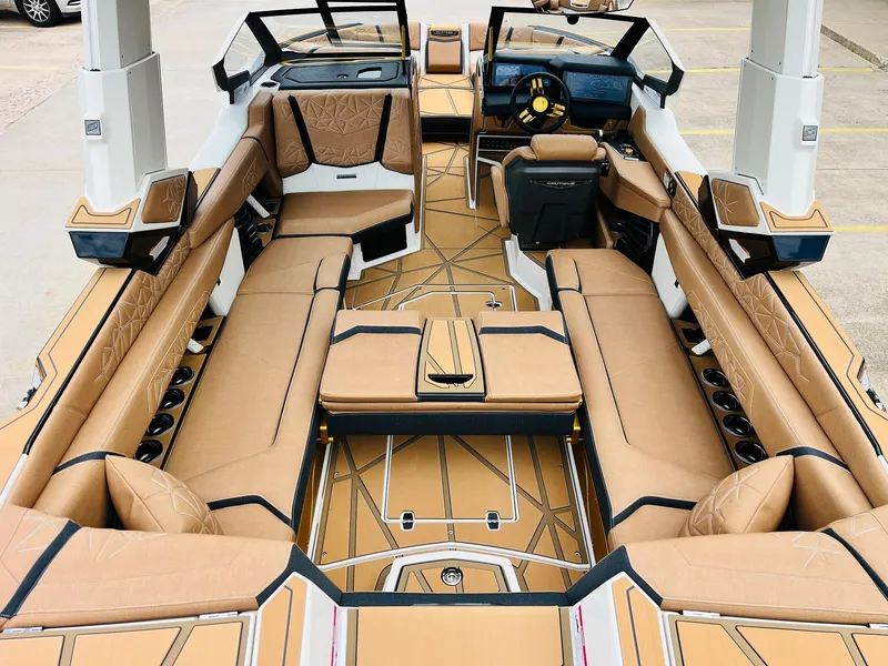 Slide: The Image of 2026 Nautique Super Air Nautique G25 Paragon interior with luxurious tan seating and modern design. - 45