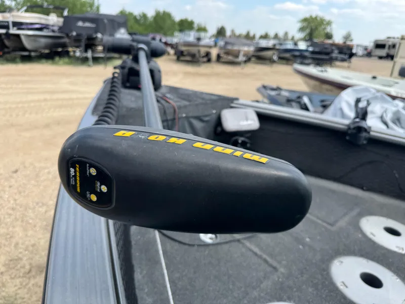 Slide: The Image of 2010 Lund 1825 Explorer boat dashboard with steering wheel and Humminbird fish finder. - 11