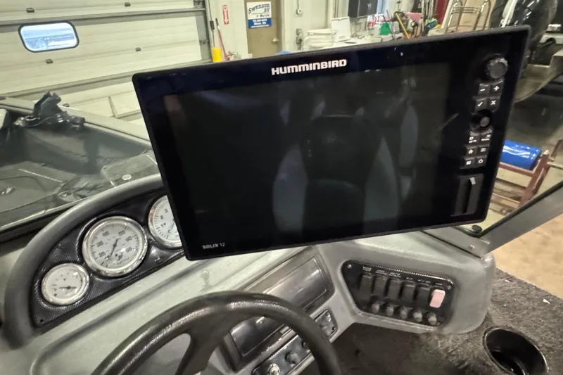 Slide: The Image of Dashboard of 2010 Lund 1825 Explorer with Humminbird Solix 12 fish finder. - 13