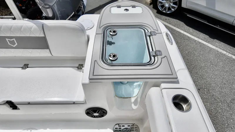 Slide: The Image of 2025 Sea Fox 228 Commander boat interior with seating and storage compartments. - 9