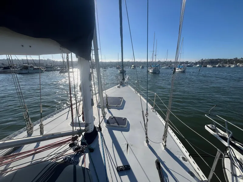 Slide: The Image of Sailing yacht Frers Custom 1976 on calm waters with clear blue sky. - 9