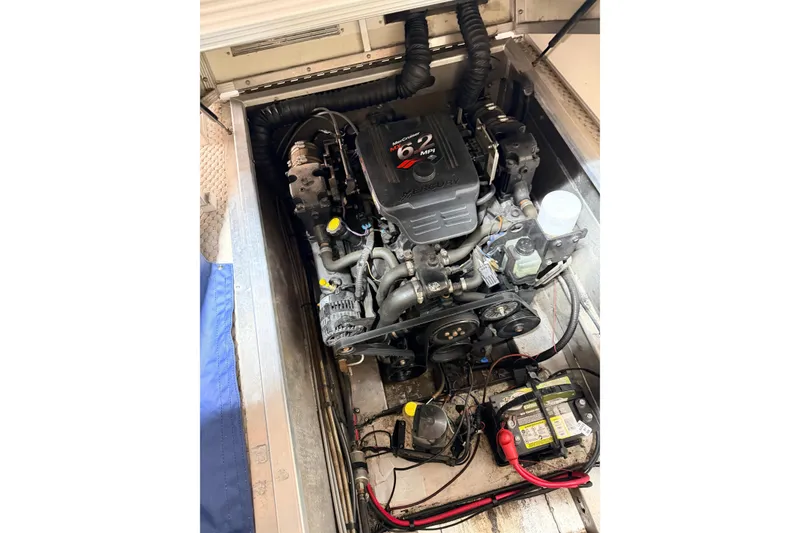 Slide: The Image of Engine compartment of a 2004 Bennington 2875RLX with Mercury 6.2 MPI engine. - 30