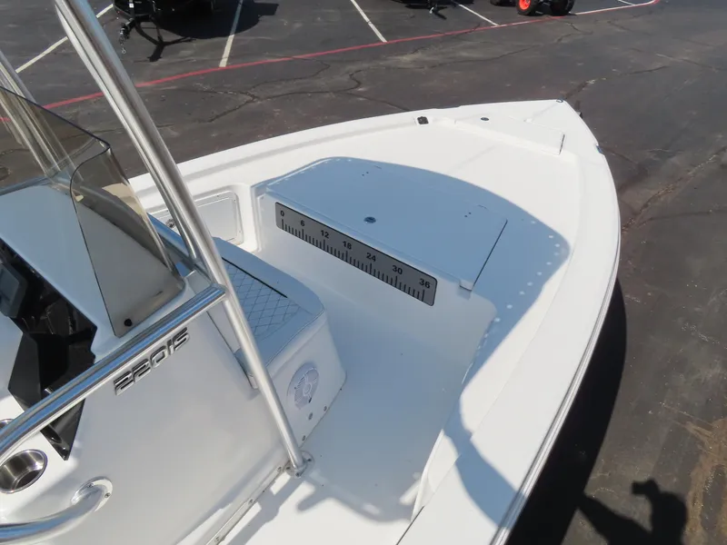 Slide: The Image of 2025 Savannah 220 IS boat deck with measurement markings, parked on asphalt. - 6