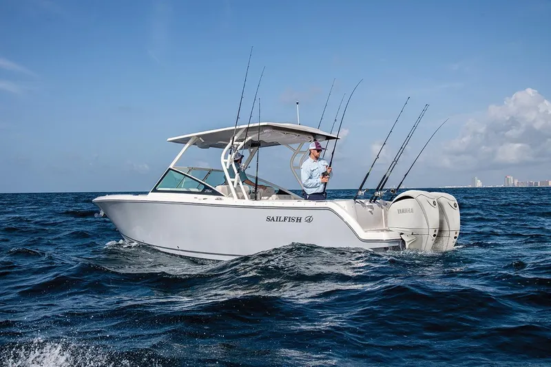 The Image of 2026 Sailfish 276 DC boat on open water, equipped for fishing. - 2