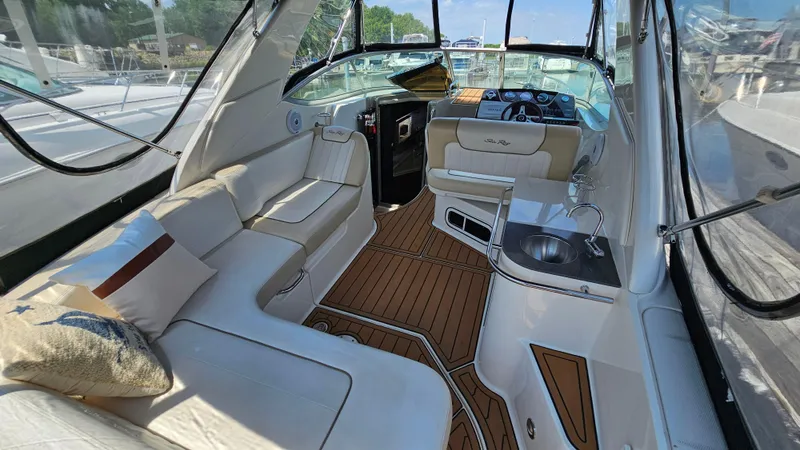 Slide: The Image of Interior of 2013 Sea Ray 280 Sundancer boat with seating and helm. - 7