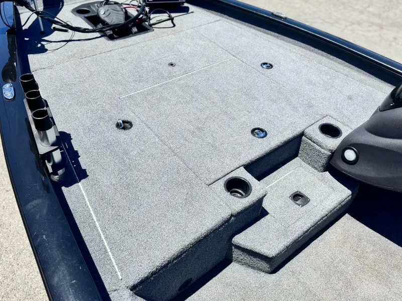 Slide: The Image of 2021 Tracker Pro Team 175 TXW boat deck with rod holders and storage compartments. - 14