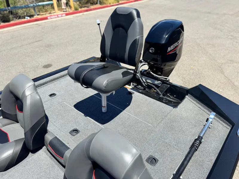 Slide: The Image of 2021 Tracker Pro Team 175 TXW boat with Mercury engine and seating. - 18