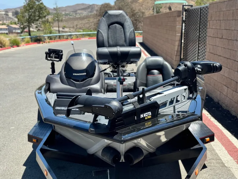 Slide: The Image of 2021 Tracker Pro Team 175 TXW boat with Minn Kota Ultrex trolling motor. - 2
