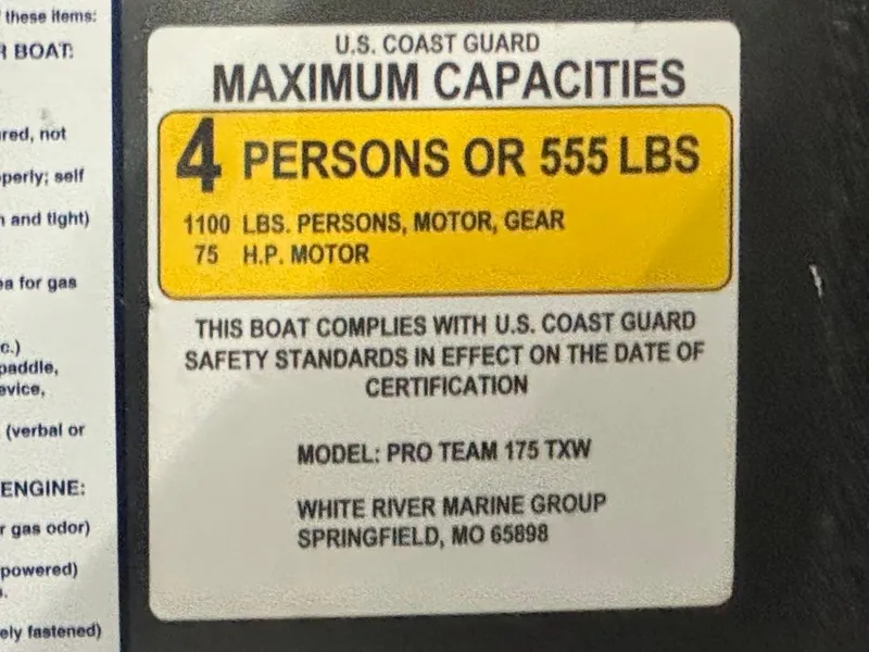 Slide: The Image of 2021 Tracker Pro Team 175 TXW capacity label, 4 persons or 555 lbs, U.S. Coast Guard compliant. - 24